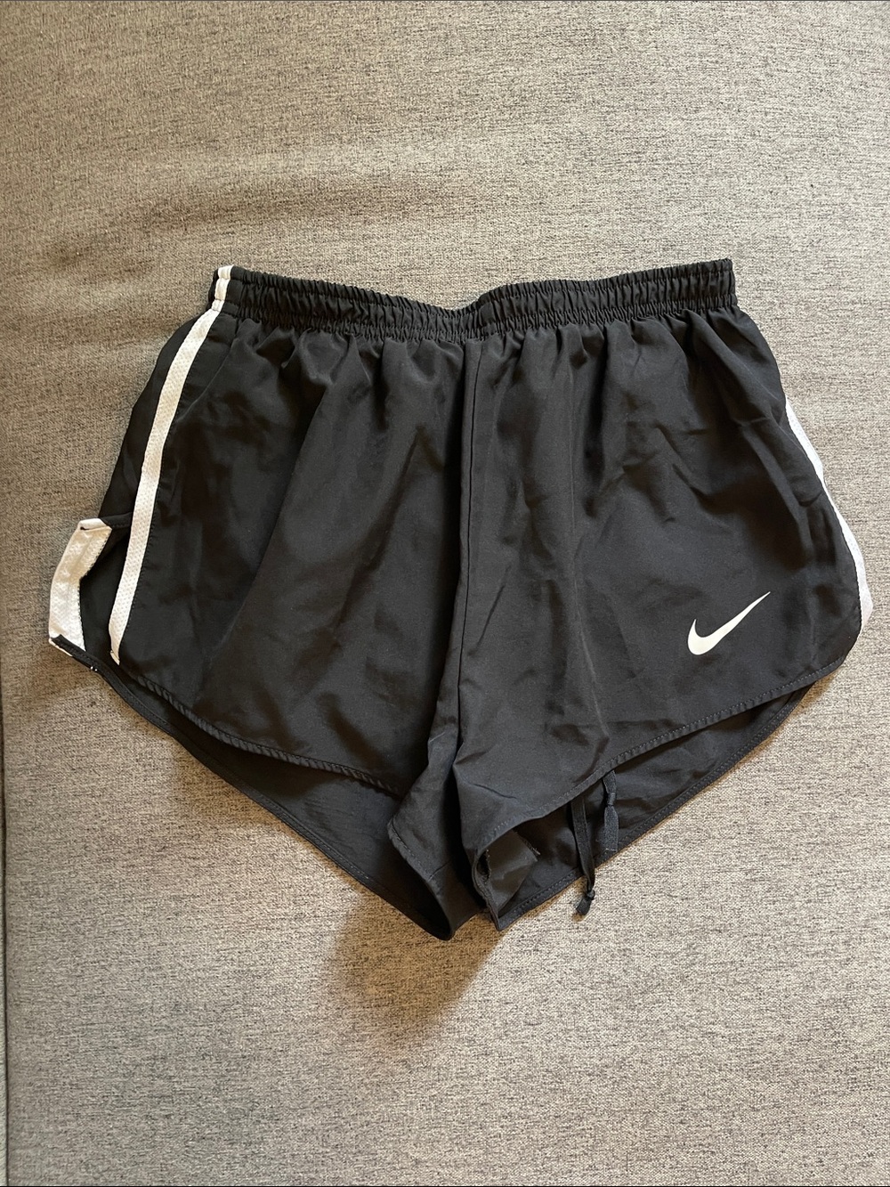 Nike Black Women's Athletic Shorts with White Swoosh and Side Stripes